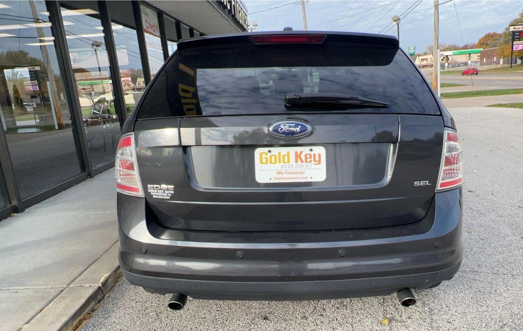 2007 Black Ford Edge SEL Plus FWD (2FMDK39C77B) with an 3.5L V6 DOHC 24V engine, 6-Speed Automatic transmission, located at 1633 W Kimberly, Davenport, IA, 52806, (563) 323-5341, 41.559456, -90.598732 - Photo#4